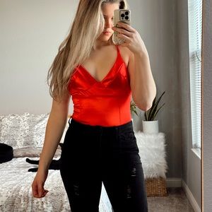 Red corset bodysuit
